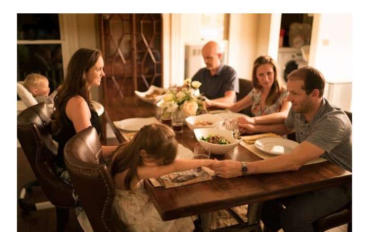 LOMA LINDA FAMILY HAVING DINNER TOGETHER. THIS IS A BLUE ZONE COMMUNITY