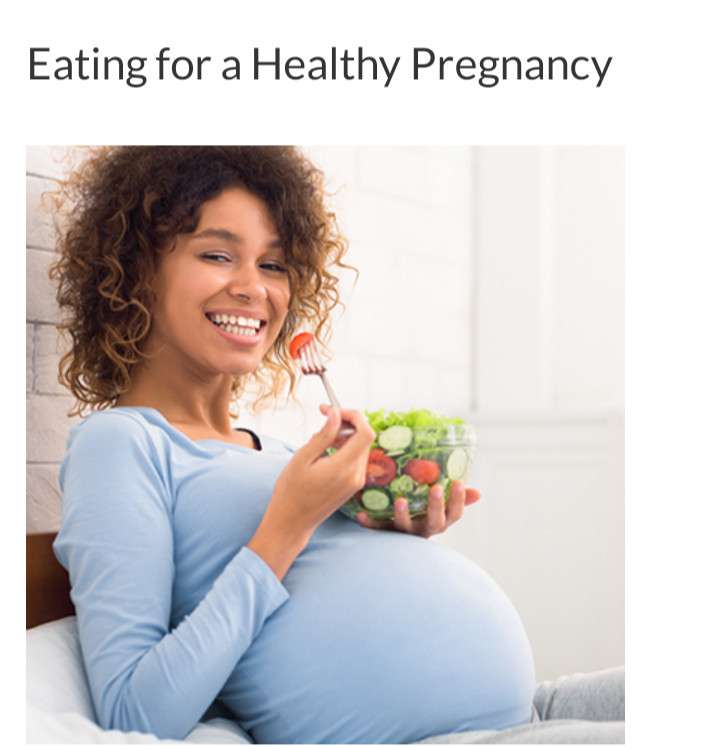 YOUNG MOM - EATING A BOWL OF SALADS FOR A HEALTHY PREGNANCY