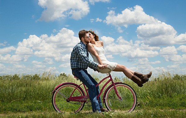 CHANGE YOUR RELATIONSHIPS - COUPLE WHERE THE GIRL IS SITTING ON THE HANDLE BARS