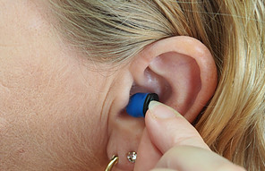 HOW TO WEAR MAGNETIC EARRING FOR WEIGHT LOSS - PICTURE OF A FEMALE WITH A MAGNETIC EARRING IN HER EAR.
