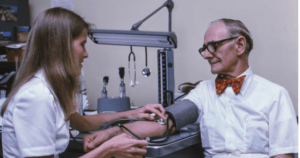 PATIENT WITH HIGH BLOOD PRESSURE CONSULTING WITH HIS