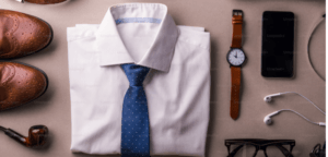 FATHER DAY GIFTS OF A SHIRT AND TIE, SHOES, WATCH NEATLY DISPLAYED