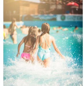 TWO FEMAILE YOUNGSTERS SPLASHING IN POOL TO KEEP COOL