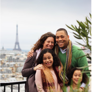 YOUNG FAMILY OF FOUR CELEBRATING  IN FRANCE AFTER PREMARITAL COUNSELING