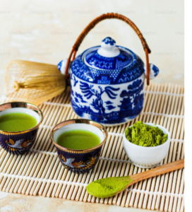 ORGANIC MATCHA GREEN TEA SERVED FROM A BLUE AND WHITE TEA POT