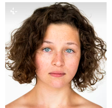 HEAL THE INNER CGIKD. THE FACE OF A YOUNG GIRL WITH SHORT, BROWN, CURLY HAIR AND BLUE EYES